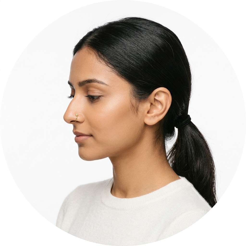 Profile alone DP girls – side profile of an Indian girl with a gold nose pin against a pure white backdrop